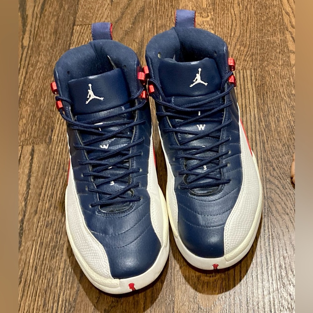 Jordan 12s red, white, and blue. REPS size 11. Good condition! Priced to sell!